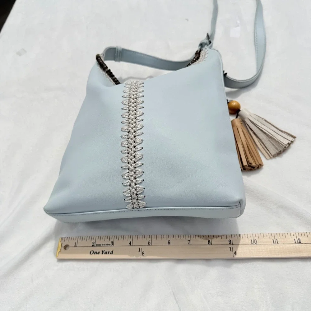 The Sak Huntley Chambray Blue Pebbled Leather Hobo Crossbody Bag Tassel Boho